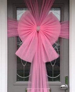 Baby Pink Door Bow is beautifully made and adds an elegant bow to your front door, windows or garage during the festive season - Order Now 01277 224622